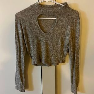 Turtleneck crop top with cutout at top of chest